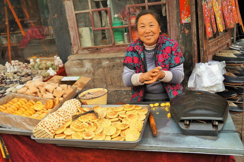 Vendedora chinesa simpática em Pingyao.